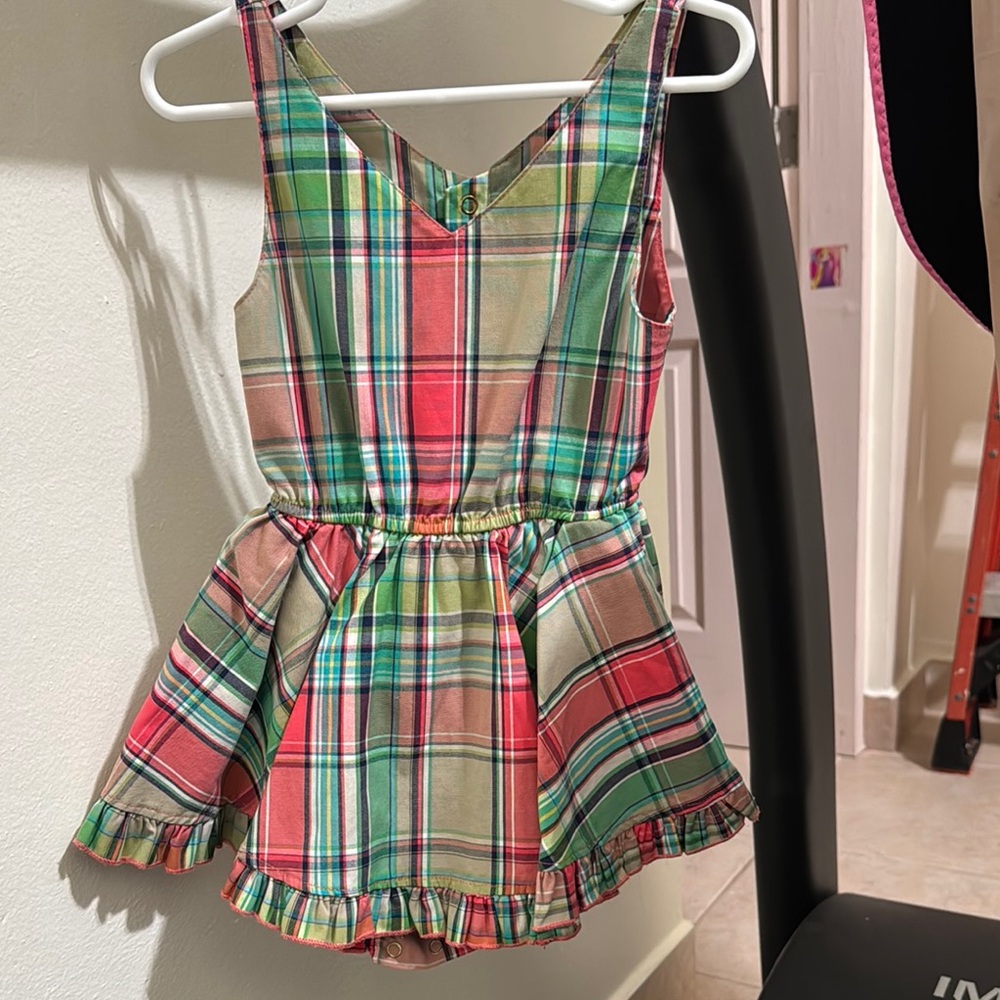 Red and Green Jumpsuit with Fitted Waist and Pleated Skirt